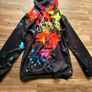 Black Hoodie with Vibrant Rainbow Paint Splatter